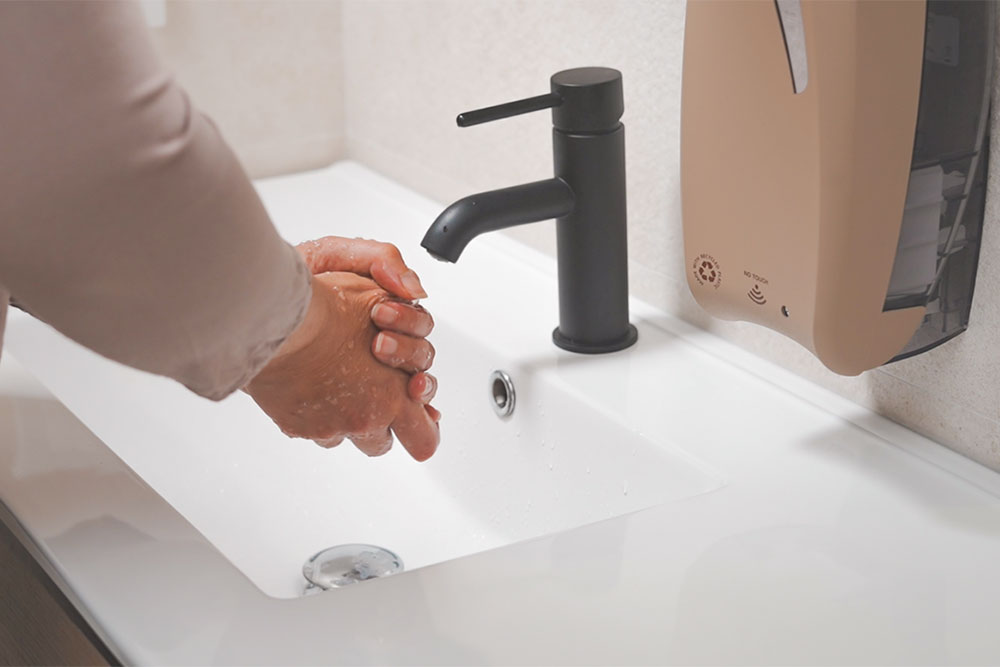 Electronic liquid soap dispenser
