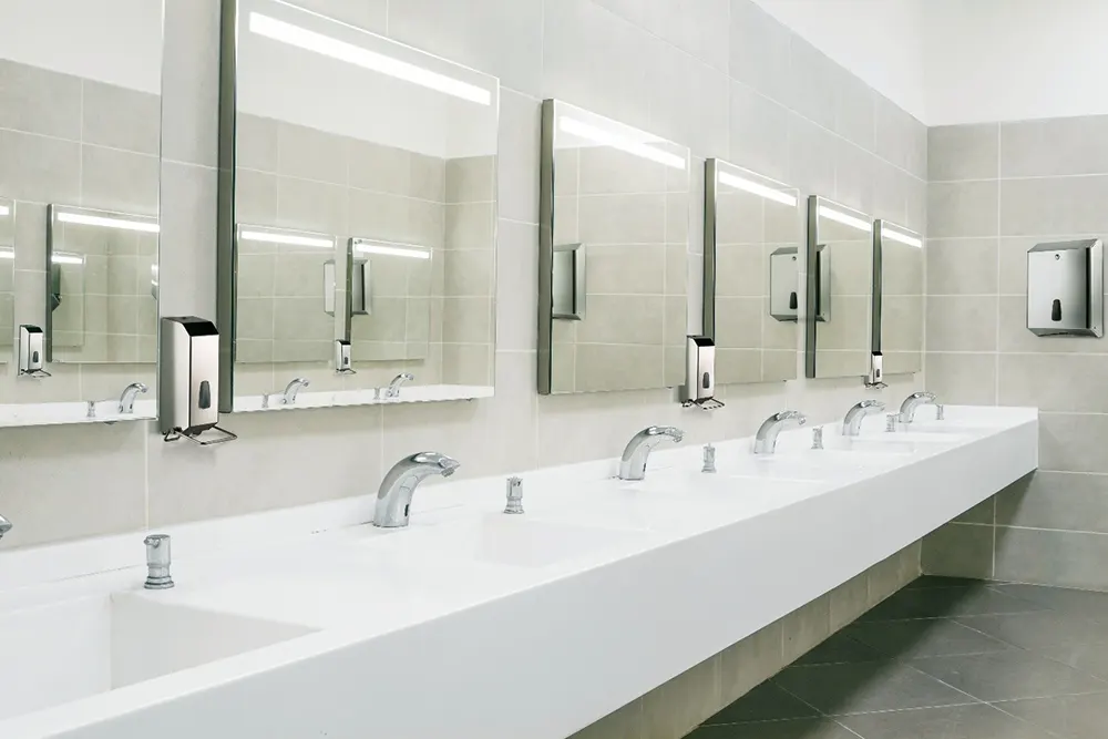 Soap dispenser - inox soap dispenser in a luxury restroom