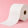 Jumbo paper towel roll on a pink background - Jumbo paper towel: Why is it the best choice for facilities with high paper consumption? - Large paper towels - Luu